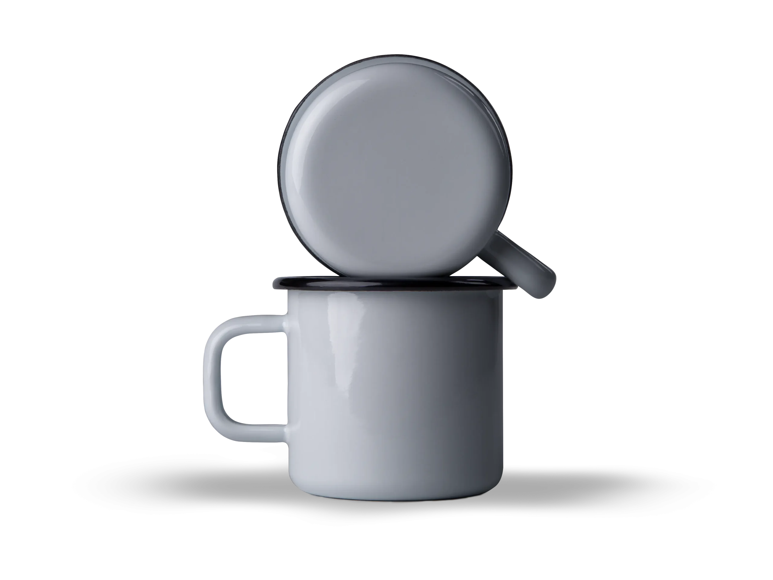 An image of two white enamel mugs stacked on top of each other. The top mug is positioned with its open end facing upwards, and its handle is visible. Both mugs have a dark rim at the top, providing a contrast to their otherwise pure white color. The background is dark with horizontal lines, giving the impression that the mugs are floating in a dark space. The simplicity of the mugs against the dark background creates a minimalist aesthetic.